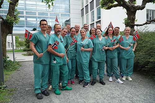 group photo of medical personell in scrubs